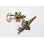 A William IV silver and coral child's teether, by John Bettridge, Birmingham, 1830, of typical form,