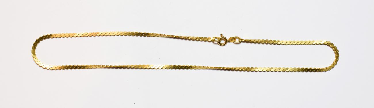 A fancy link chain stamped '750', length 39.5cm . Gross weight 10.6 grams.