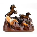 A Beswick rearing Welsh cob, model No. 1014 and Arab "Xayal", model No. 1265, dark brown gloss