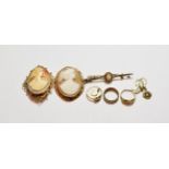 Two Victorian cameo brooches, stamped '9CT'; a cameo bar brooch, stamped '9CT', length 6.4cm; a pair