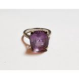 An amethyst ring, stamped '9CT', finger size R. Gross weight 7.4 grams