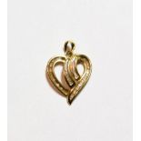 A diamond set heart shaped pendant, length 2.2cm . Gross weight 1.9 grams.