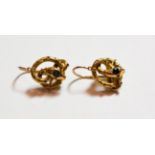 A pair of 15 carat gold gemset snake earrings . Gross weight 4.3 grams.