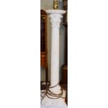 A tall alabaster table lamp on square base