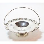 An Elizabeth II silver basket, by Carr, Sheffield, 2001, shaped circular and on spreading foot, with