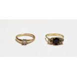 A 9 carat gold princess cut diamond solitaire ring, finger size M; and a gemset ring, stamped '585',