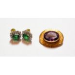 An amethyst brooch, unmarked, length 2.4cm; and a pair of paste set earrings . Brooch - 4.1 grams.