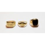 A 9 carat gold signet ring, misshapen; and two further signet rings, unmarked . 9 carat gold