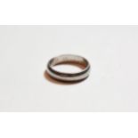 A platinum band ring, finger size T1/2. Gross weight 10.7 grams.