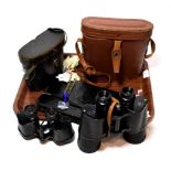 Two pairs of cased field binoculars; and a hand bag with race day badges