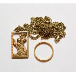 A 22 carat gold band ring, finger size Q1/2; and a 9 carat gold pendant on a 9 carat gold chain .