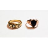 A 9 carat gold bloodstone signet ring, finger size P; and a three pearl ring, unmarked, finger