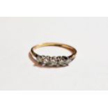 A diamond five stone ring, finger size R1/2. Stamped 'PT &???' remainder of the mark is rubbed, we