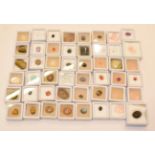 A quantity of loose gemstones including rose quartz, tiger's-eye, mother-of-pearl, rock crystal,