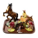 A Beswick 'Susie Jamaica' figure; a Beswick rearing Welsh cob; another Beswick horse; and a pair