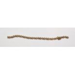 A 9 carat gold diamond bracelet (a.f.), length 19.5cm . Gross weight 8.9 grams.