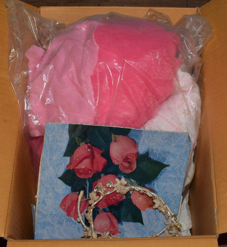 A quantity of textiles to include girls clothes, handkerchiefs and a white dress (one box)