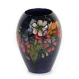 Walter Moorcroft (1917-2002): A Spring Flowers Pattern Vase, impressed factory marks MOORCROFT