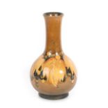 William Moorcroft (1872-1945): A Yellow Flambé Leaf and Grape Pattern Vase, impressed marks,
