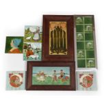 A Group of Art Nouveau Tube Lined Tiles, various subjects, including Dutch figures, flowers and