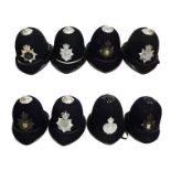 Four Pre-1953 Police Custodian Rose Top Helmets, two with blackened helmet plates and chrome tops to