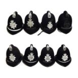 Six Elizabeth II Police Custodian Coxcomb Helmets, with chrome coxcombs and helmet plates to:-