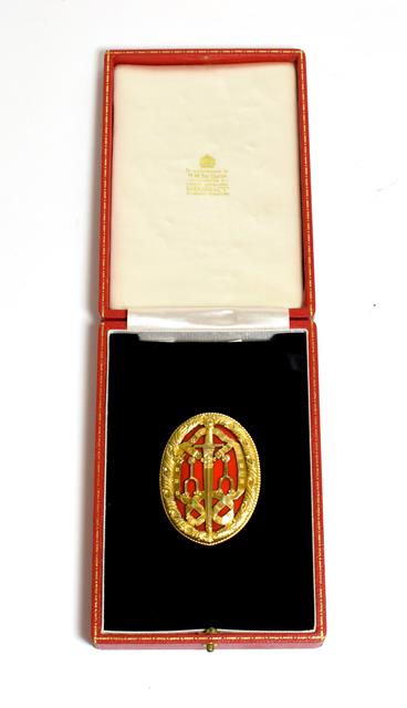 A Knight Bachelor's Badge, in silver gilt and red enamel, hallmarks for London 1957, in case of