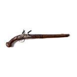 An 18th Century Continental Flintlock Holster Pistol, the 36cm steel barrel with chiselled formal