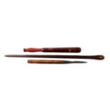 A Victorian Painted Wood Truncheon, the rounded maroon body painted with crowned VR cypher,