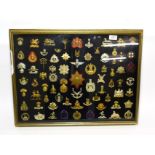 A Collection of Seventy Five British Cap, Glengarry and Collar Badges, in brass, bi-metal, white