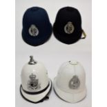An Elizabeth II Isle of Man Police Helmet, in white hard plastic, with chrome ball top and helmet