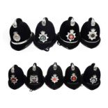 Nine Elizabeth II Police Custodian Coxcomb Helmets, with chrome coxcombs and enamelled chrome helmet