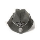 A German Third Reich SS Officer's Overseas Cap, in field grey wool mix, the fold-down sides with