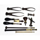 A Collection of 19th Century Gun Accessories, comprising a turnscrew with walnut handle, an ivory