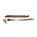 A Dyak Head Hunter's Mandau, with 57cm clip point steel blade, the bone hilt with woven brass