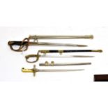 Three Miniature Sword Paperknives, one as a mameluke sword with ivory grip and parcel gilt plated