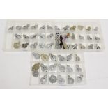 A Collection of Fifty Four Pre-1953 British Police Cap Badges, in white metal and chrome,