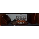 An Edwardian mahogany and satinwood inlaid twin-handled tray; a pair of postal scales and weights; a