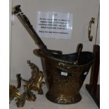 A brass coal bucket; and three steel fire irons