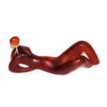 A Daum pate-de-verre abstract figure, incised 'Cde Feltre', modelled reclining, 227/500, 25cm long