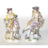 A pair of 18th century style Sitzendorf pastoral figures