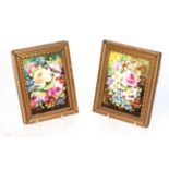 A pair of English painted porcelain plaques floral sprays, one signed F. James (2)