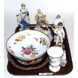 A Meissen style porcelain figure of a flower seller, marked R1762; with other Continental figures; a