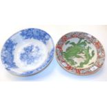 A Masons Ironstone bowl decorated with a Chinoiserie dragon; together with a blue and white bowl (