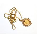 An 1897 half sovereign loose mounted as a pendant on chain, pendant length 4.8cm, chain length 61cm