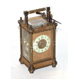 A brass striking and repeating carriage clock