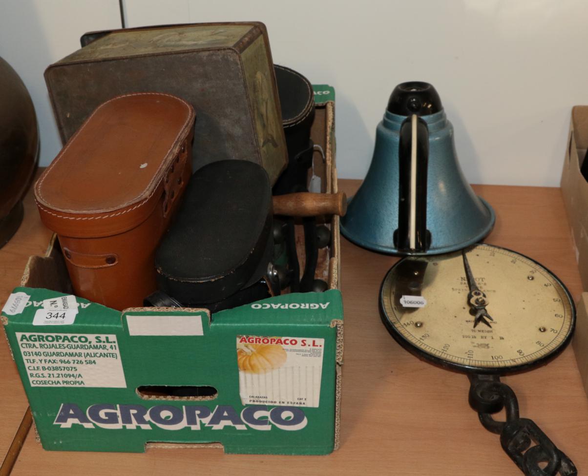 A megaphone and a box of binoculars etc