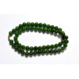 An aventurine quartz bead necklace, length 63cm . Gross weight 98.2 grams.