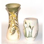 A Moorcroft pottery vase, 'Mimosa' pattern by Sally Tuffin, 31cm high; and another Moorcroft