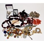 A box of costume jewellery including amber type beads, wristwatches and two fountain pens etc